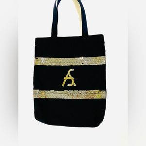Canvas Tote bag color black with gold sequin
Pre owned in fair condition